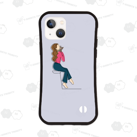 猫を抱きかかえる女性