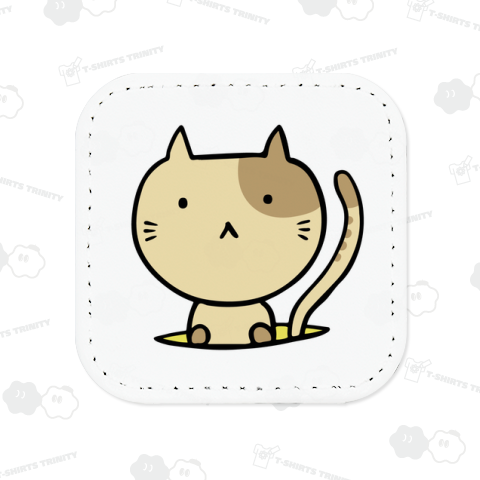 穴から顔を出すネコ